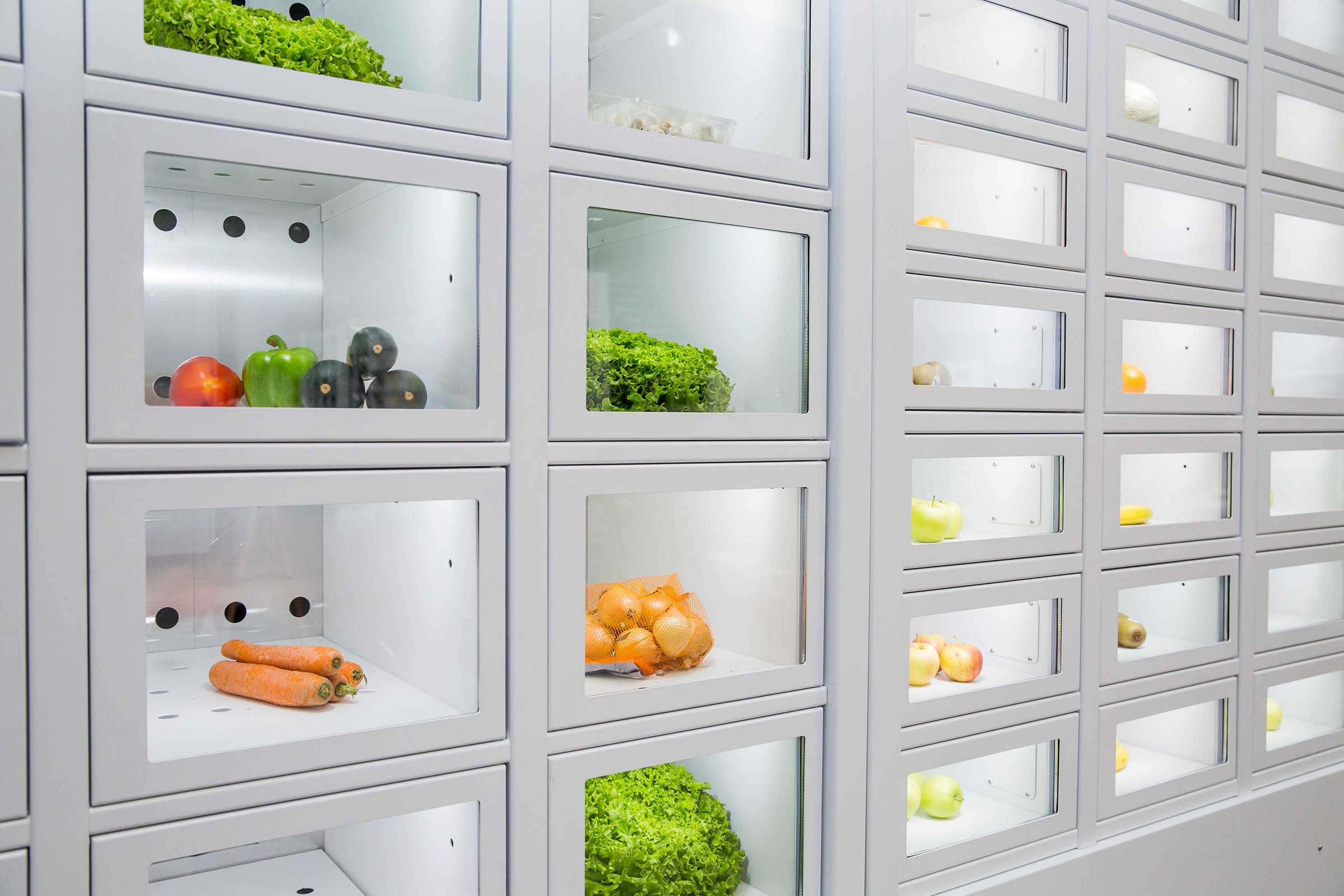 Verduras en un casier français, el distribuidor automático de productores independientes